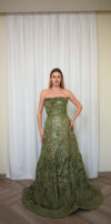 Model wearing a strapless ball gown with rosette detailing, sequin embroidery, and textured layered skirt in Olive Green – Casa Reina Boutique
