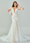Bride wearing a regal long-sleeved ball gown with beaded embroidered bodice and illusion neckline from Casa Reina Bridal Collection
