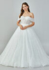 Bride wearing a crystal-embellished off-shoulder corset ball gown with glittering tulle skirt from Casa Reina Bridal Collection